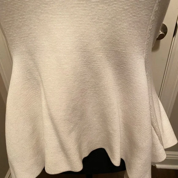 BCBGMAXAZRIA BCBG Cream peplum sweater top. SzM - Picture 7 of 8